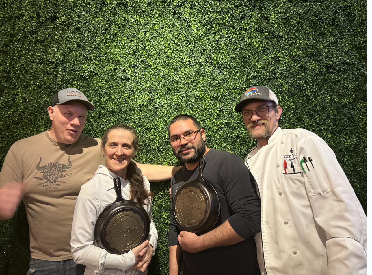 Winners with cast iron skillet trophies